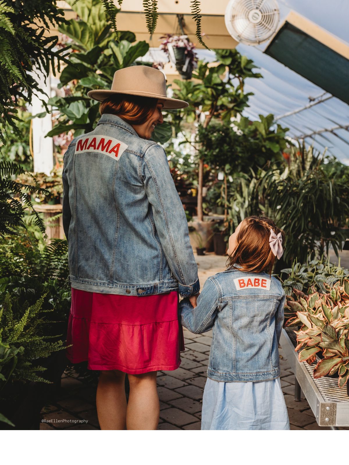 image of maria and her daughter from behind wearing matching denim jackets that say mama and babe on them